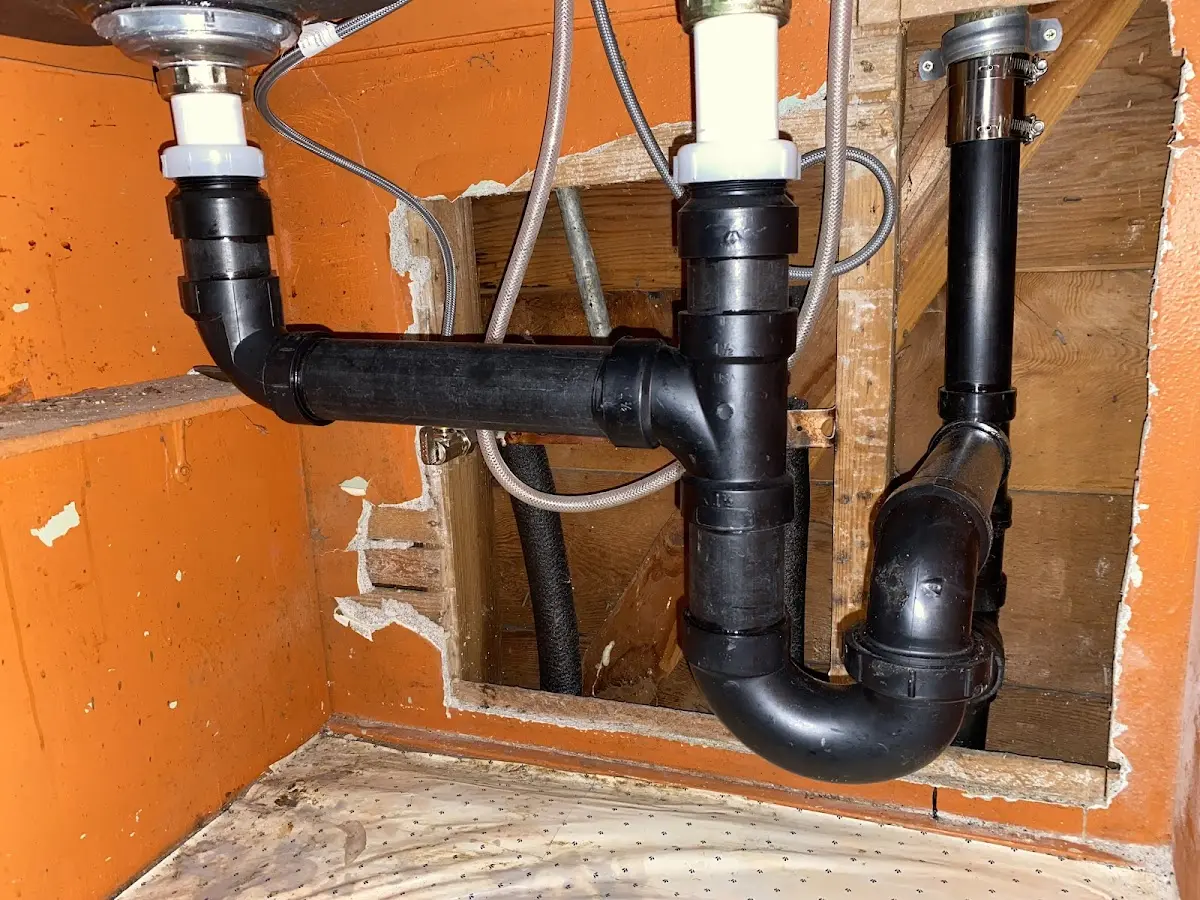 Professional Garbage Disposal Repair equipment and tools on the job in Russellville